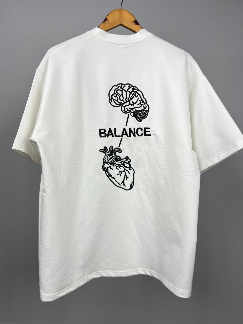 Head & Heart T-Shirt Black – Back view on model